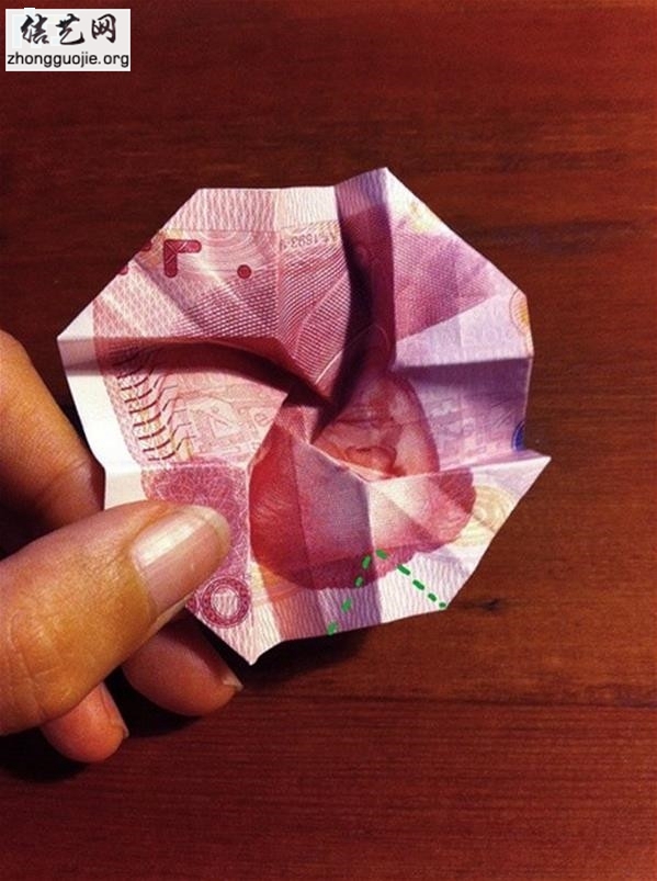 用钱折玫瑰花步骤图解怎么用100元钱折玫瑰花教程╭纸的折法